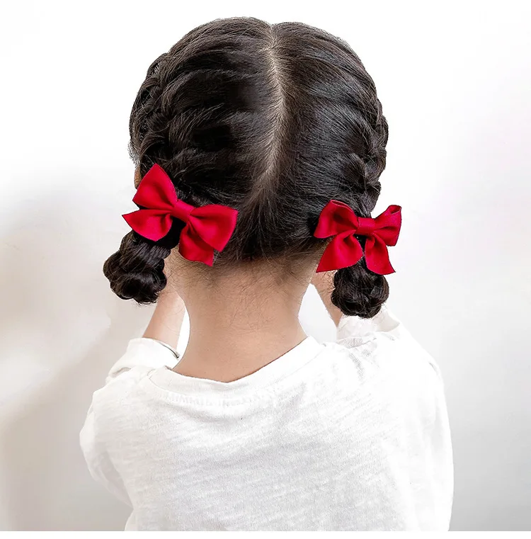 Clips de cabello con lazo rojo de red