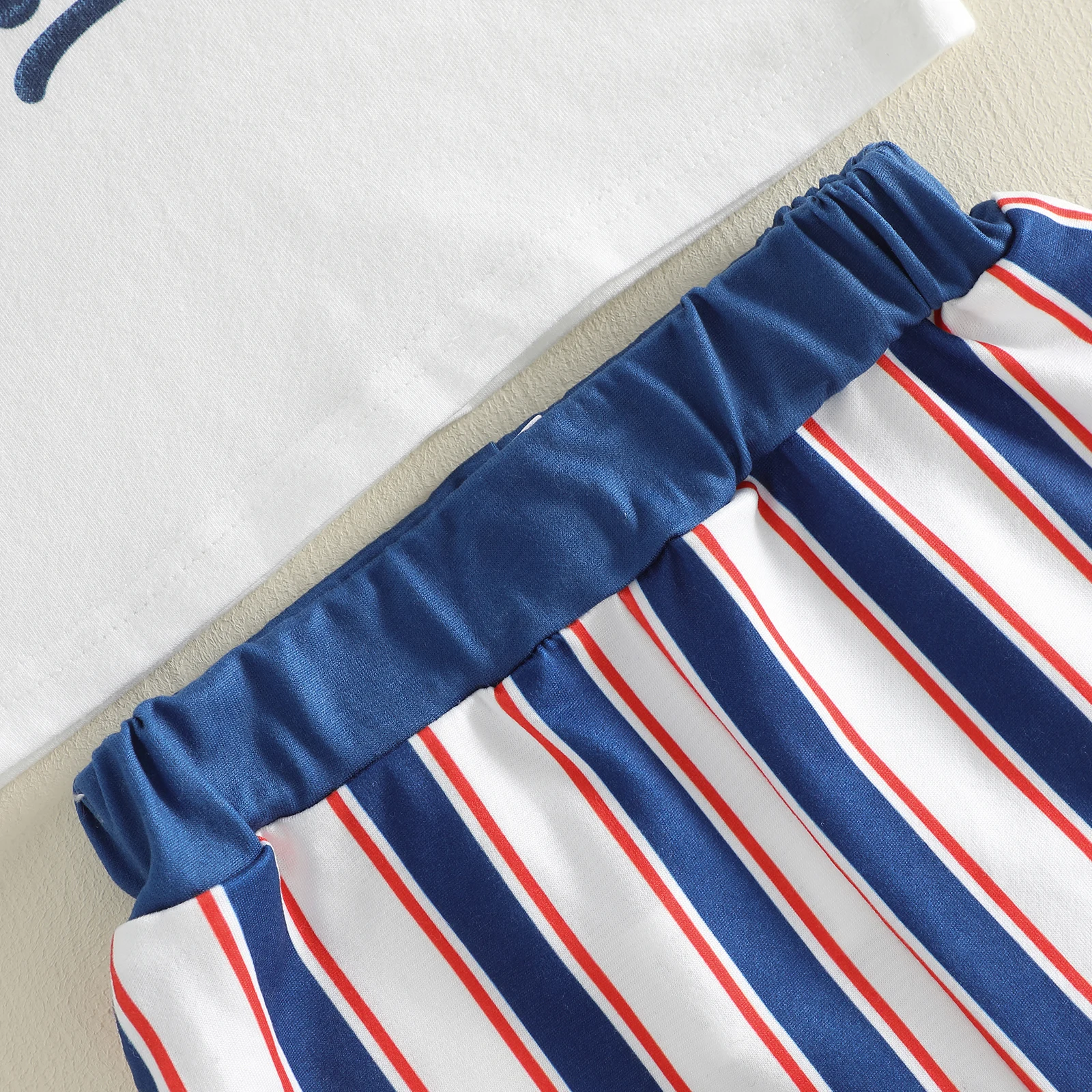 Conjunto de bebé estilo béisbol con letras y pantalón a rayas - imagen 5