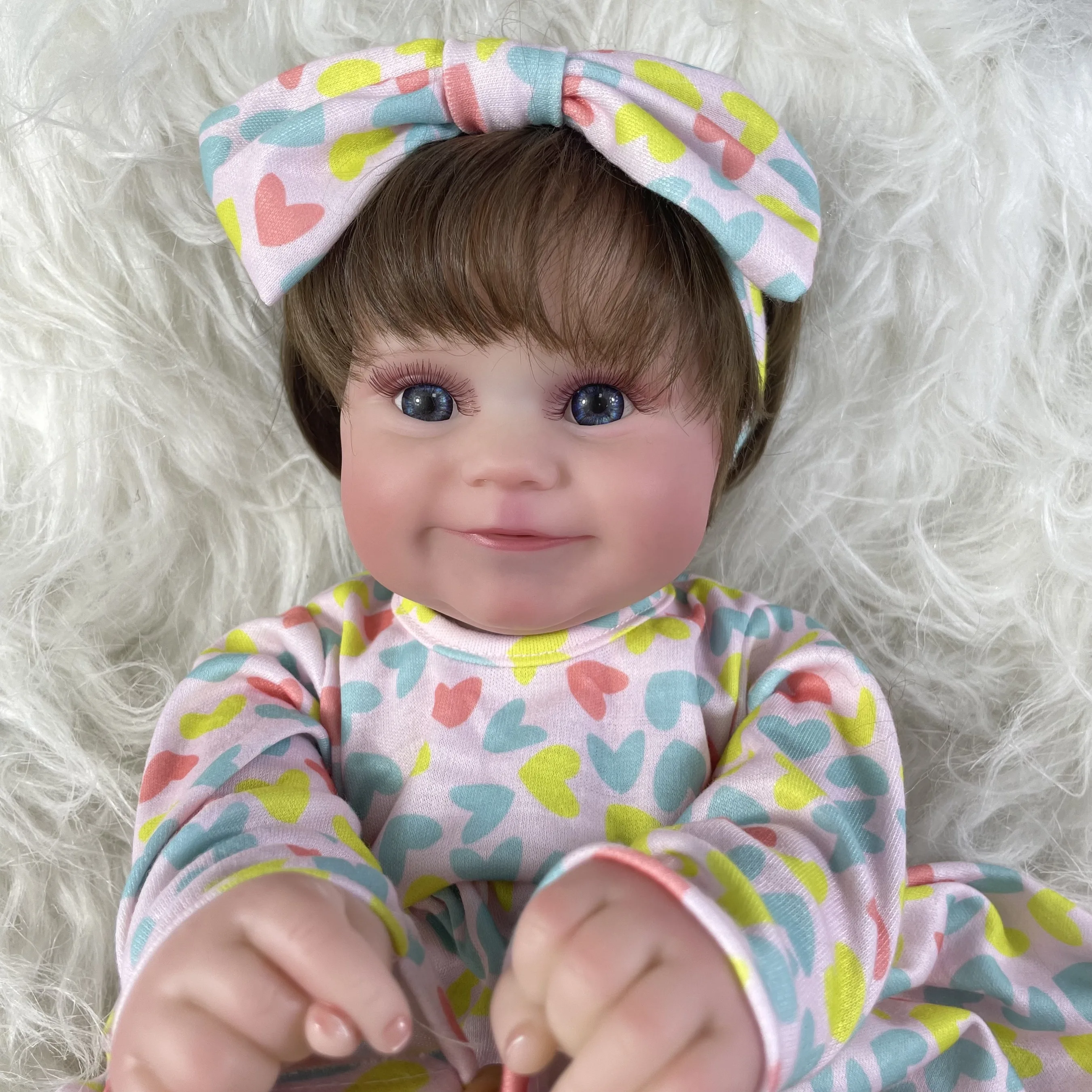 Muñeca Reborn Maddie de vinilo con cuerpo lavable y ojos abiertos