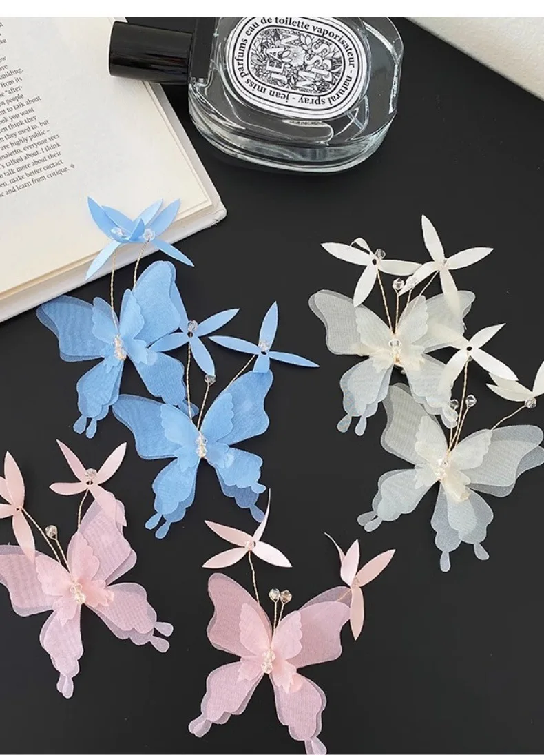 Clip de mariposa de malla en tonos pastel