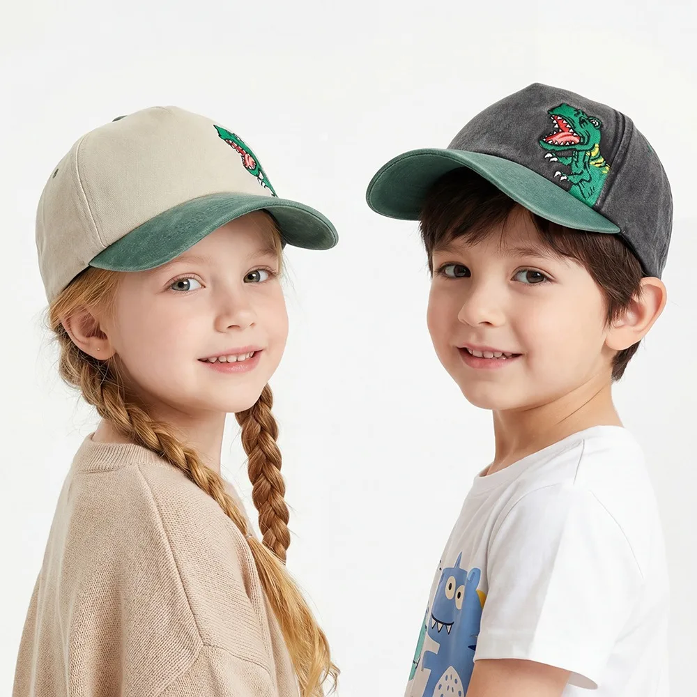 Gorra infantil de dinosaurio con protección UV ligera