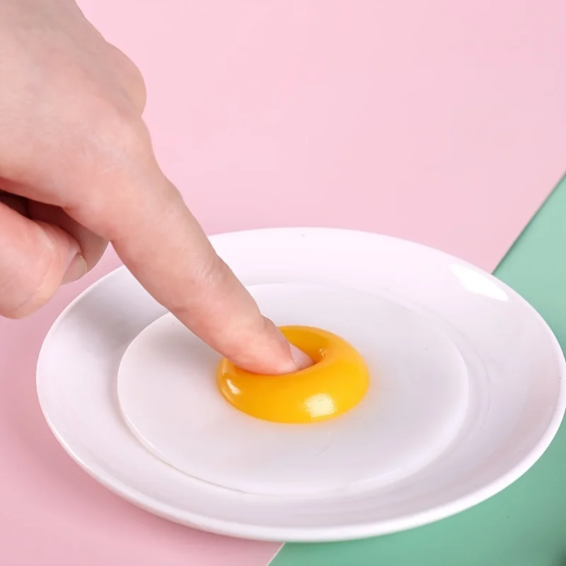 Funky Egg Splat Ball pelota antiestrés huevo estrujable para niños - imagen 5
