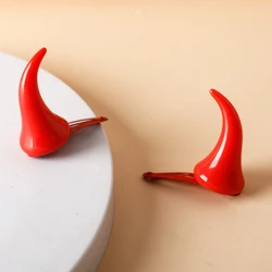 Pinza de pelo con cuernos de demonio para niña