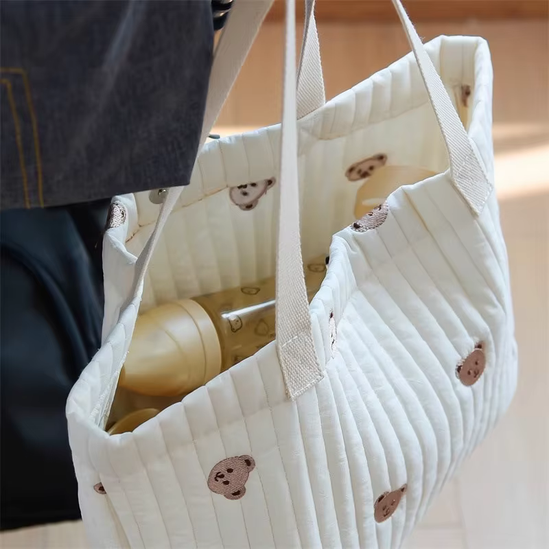 Bolsa de pañales bordada en algodón portátil para bebé