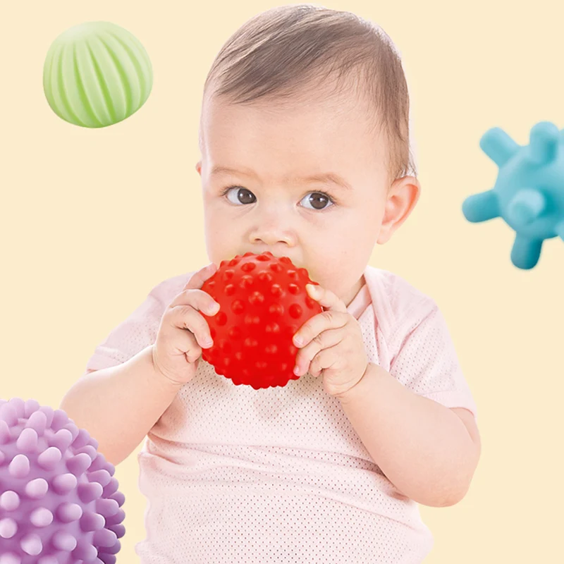 Bolas sensoriales multicolores con diferentes texturas