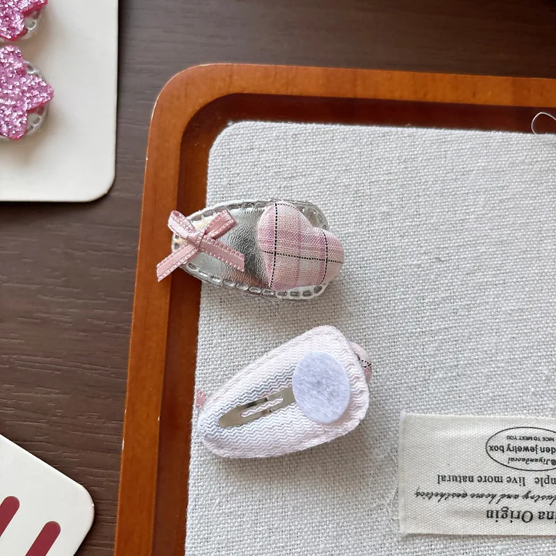Pinzas para el pelo rosa plateado con estrella, lazo y cuadros - imagen 3