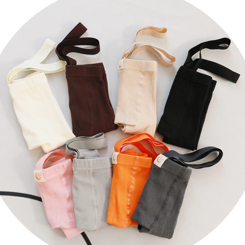 Pantalones con tirantes para bebé de cintura alta y tiras cruzadas - imagen 2