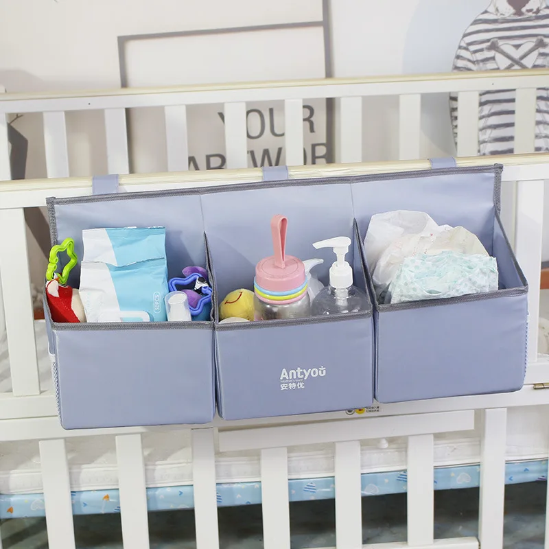 Organizador colgante de pañales para la cuna del bebé - imagen 4