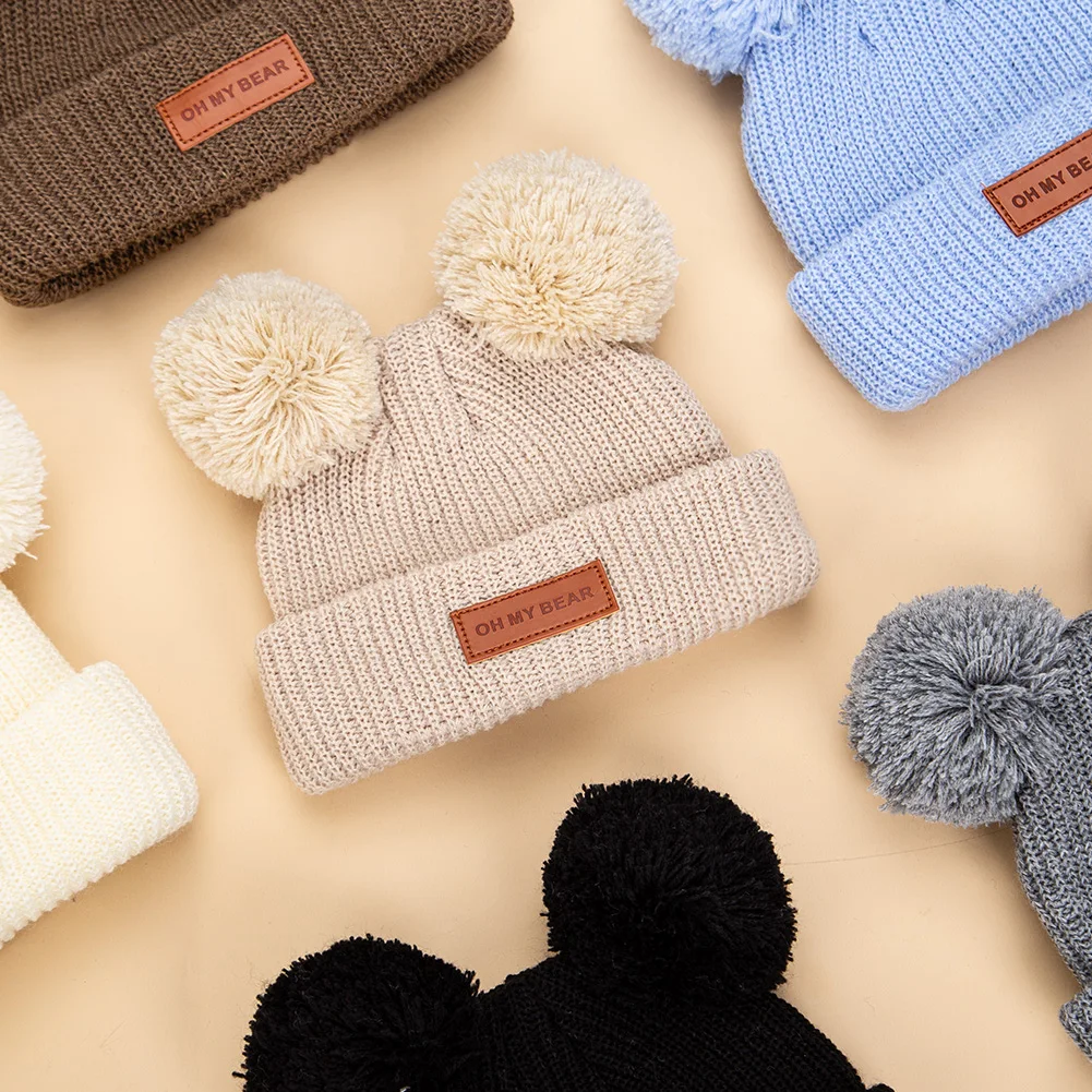 Gorro y diadema con pompón