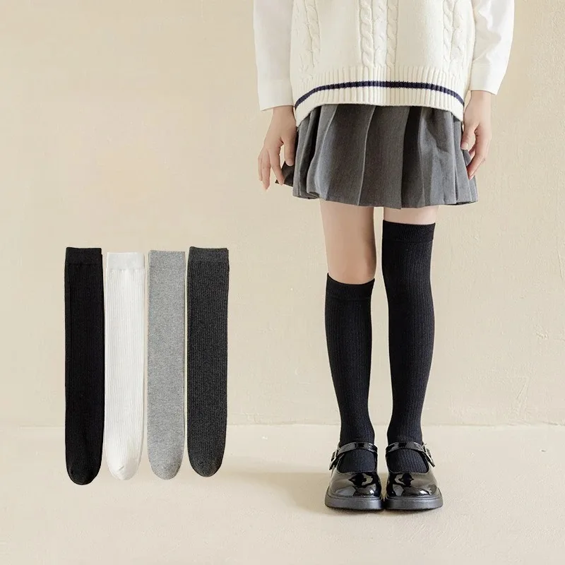 Calcetines altos hasta la rodilla blancos y negros sin costuras