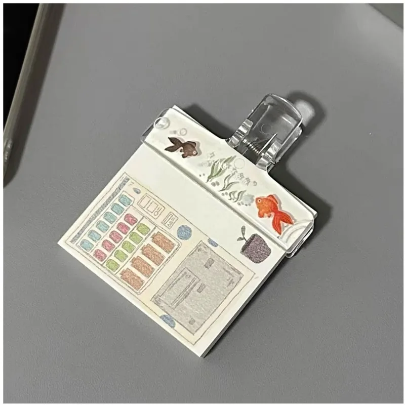 Pinza transparente de acrílico para sujetar cuadernos y documentos - imagen 5