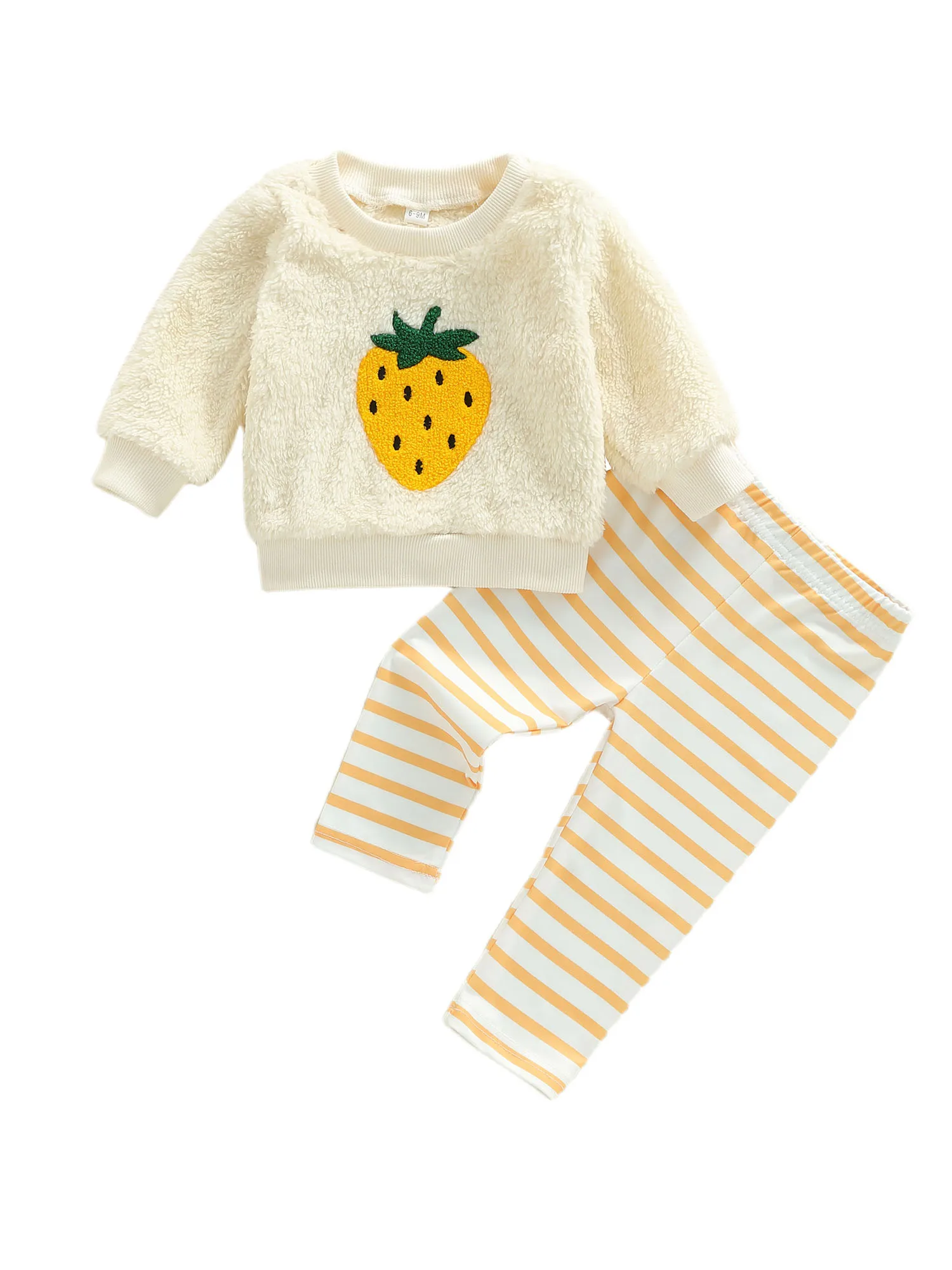 Camisa con bordado de fresa y pantalones a rayas