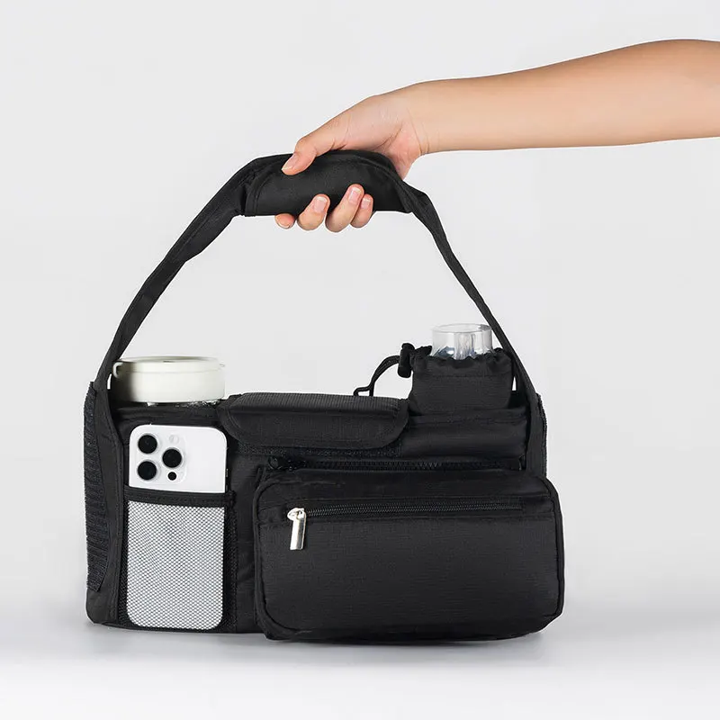 Bolsa de pañales Doona para cochecito, impermeable negra portátil - imagen 3
