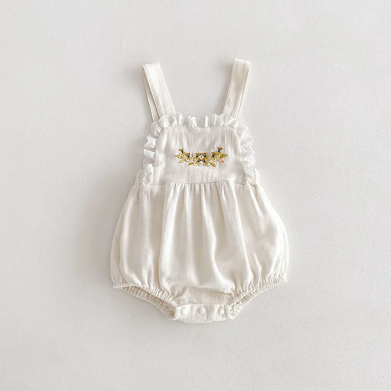 MILANCEL Body bebé primavera con flores bordadas en encaje