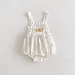 MILANCEL Body bebé primavera con flores bordadas en encaje