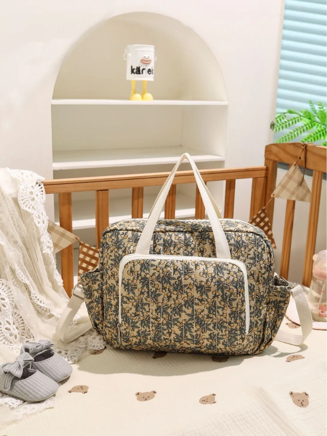 Bolsa de pañales acolchada y bordada