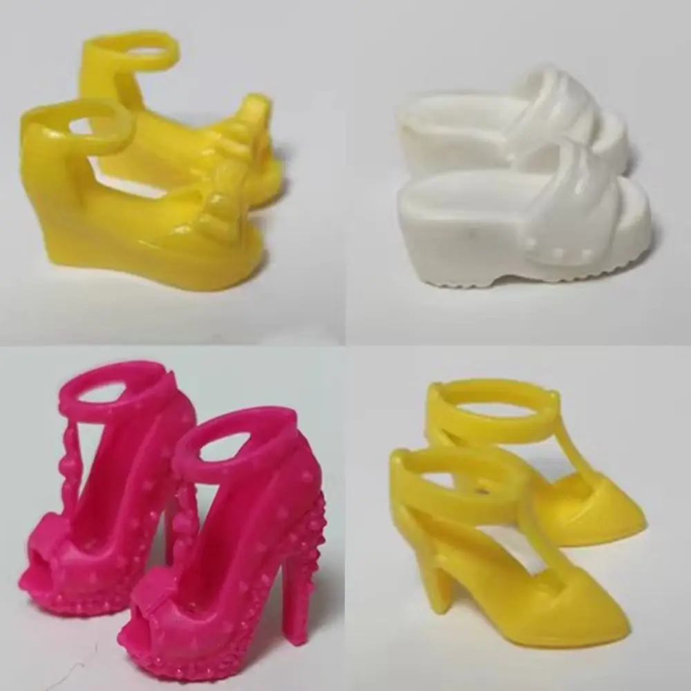 Zapatos de tacón para muñeca en color rosa