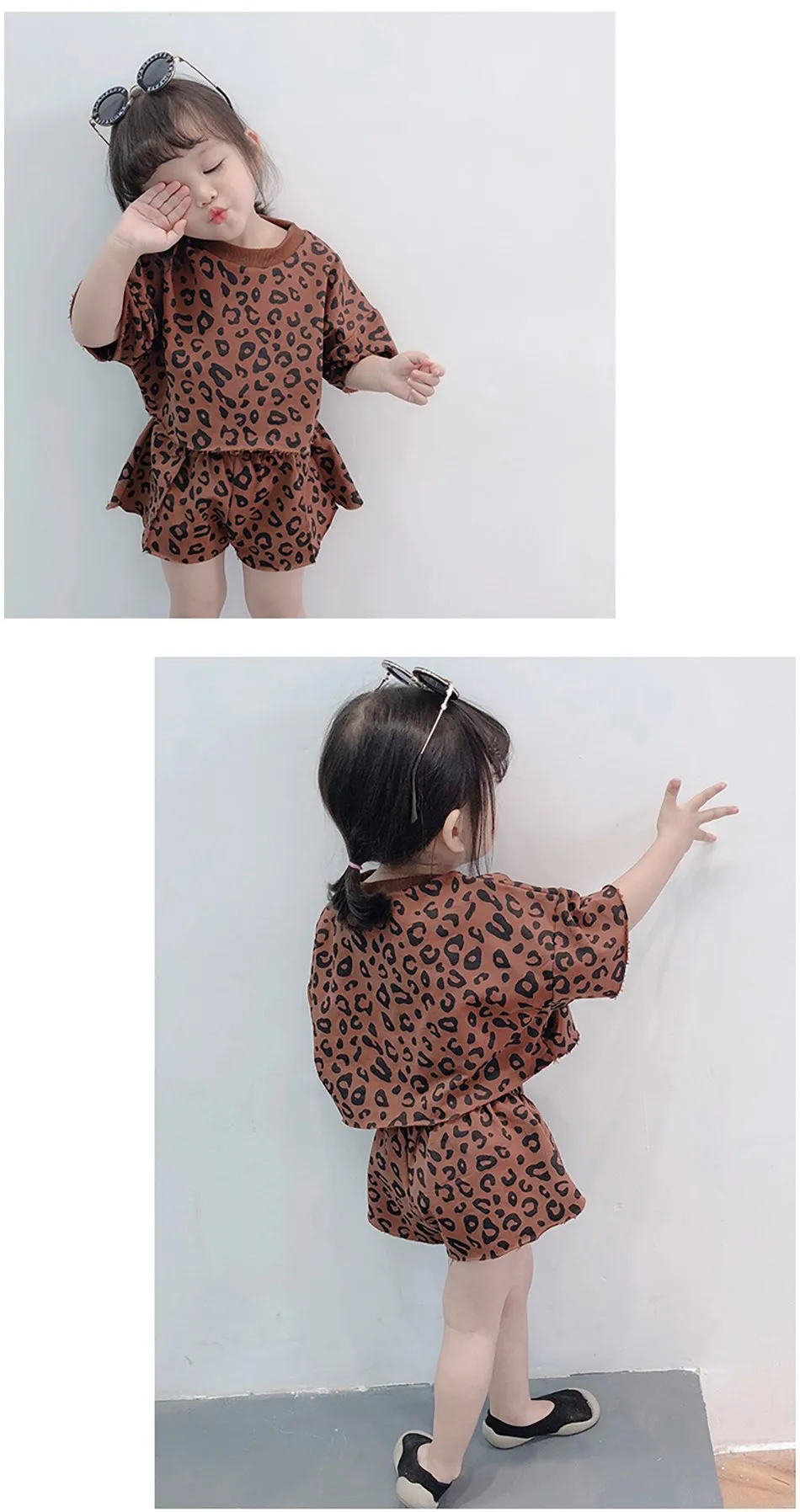 Niña usando el conjunto de leopardo en interiores