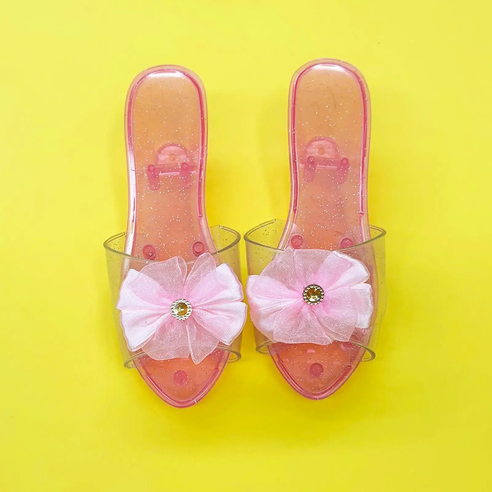 Sandalias de gelatina infantiles con lazo rosa