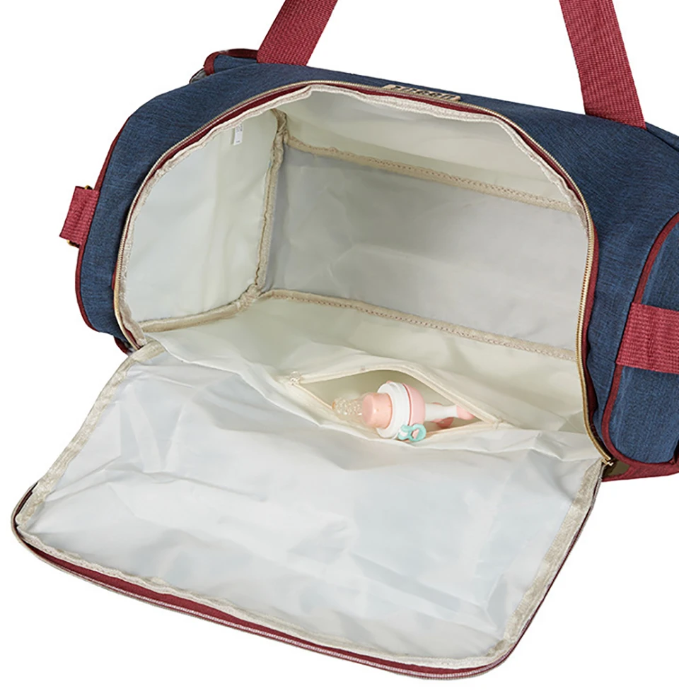 Bolsa para pañales impermeable con bolsillos y diseño ergonómico - imagen 5