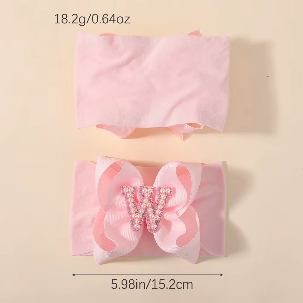 Diadema de perlas con lazo rosa grande para niña – banda nailon suave