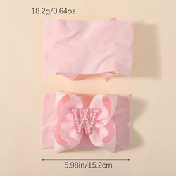 Diadema de perlas con lazo rosa grande para niña – banda nailon suave