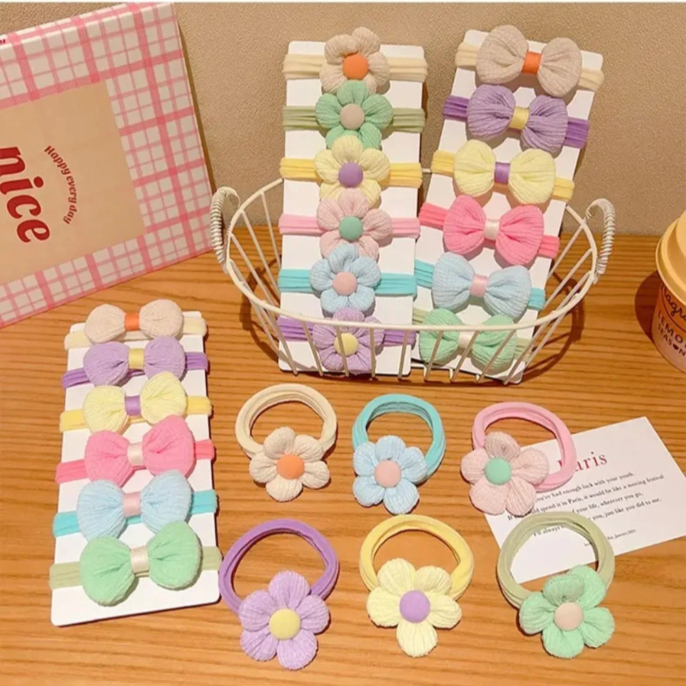 Set de 6 anillos para el cabello con flores coloridas