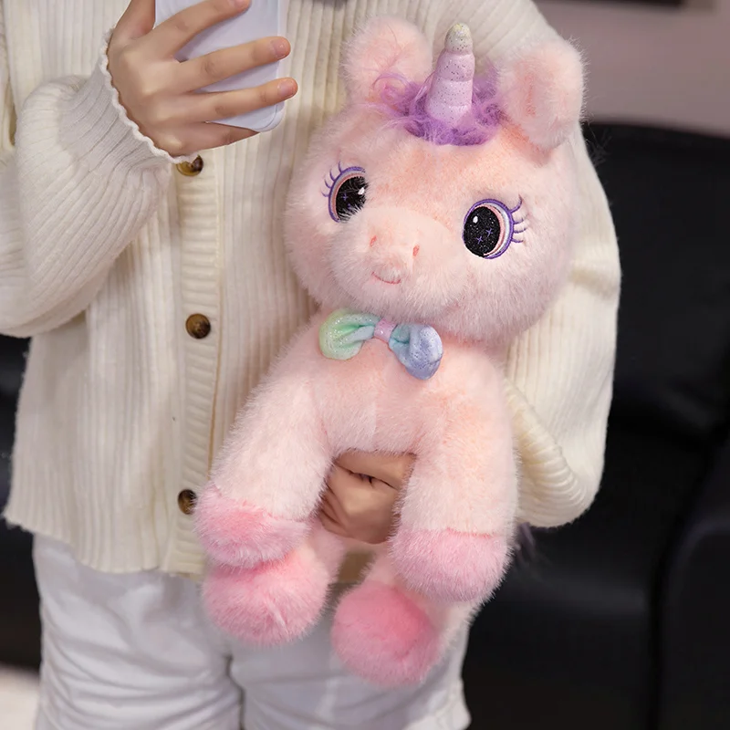 Peluche unicornio arcoíris con alas, almohada angelical