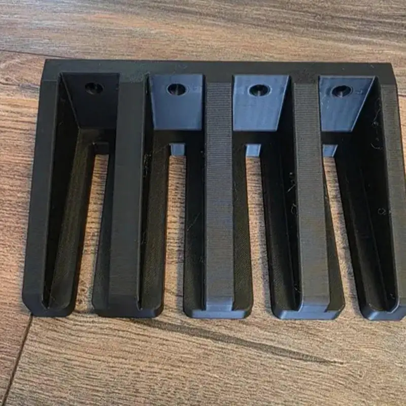Soporte para abrazaderas de pared negro de alta durabilidad - imagen 3