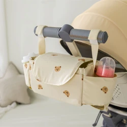 Bolsa organizadora para cochecito con portabotellas