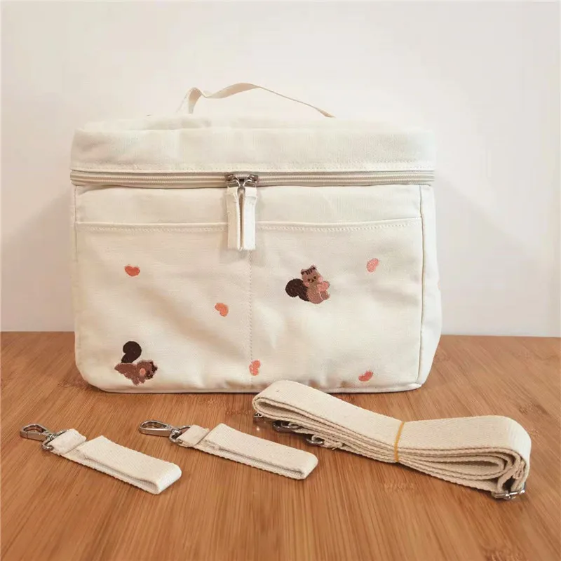 Bolsa organizadora para cochecito con múltiples compartimentos