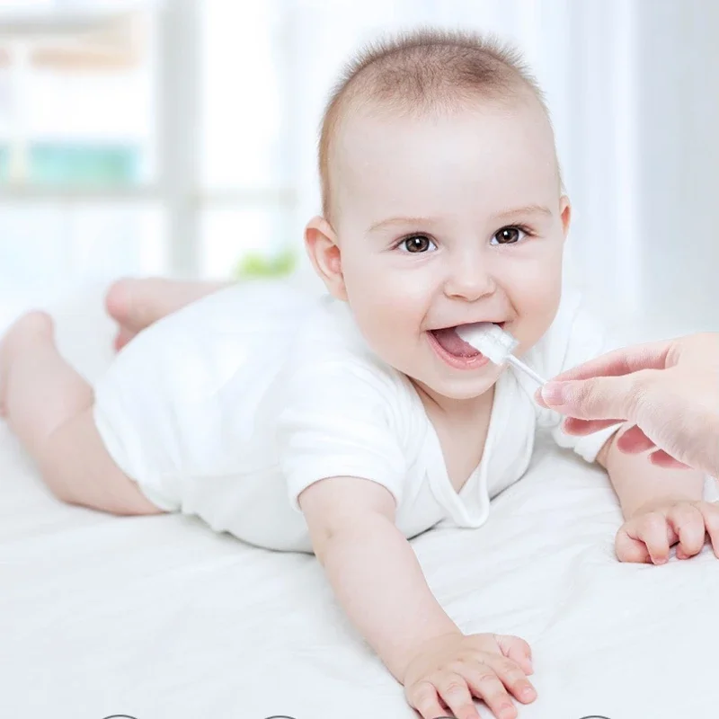 Cepillo de dientes de bebé desechable con gasa para recién nacido - imagen 4