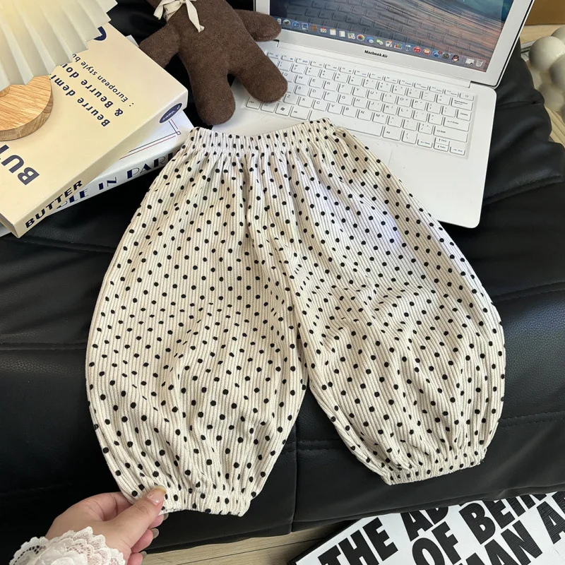 Pantalones de niña casuales con lunares y puños elásticos