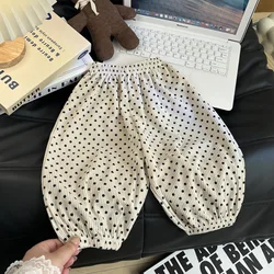 Pantalones de niña casuales con lunares y puños elásticos