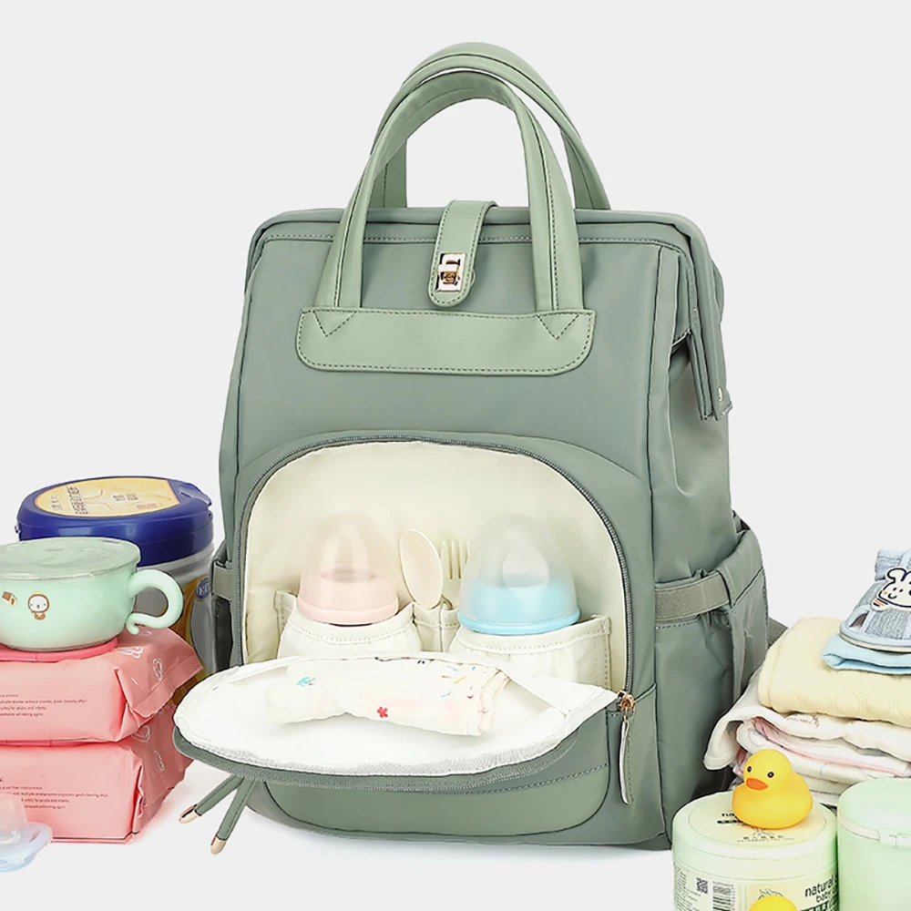 Bolsa de pañales verde salvia con mochila informal y muchos bolsillos - imagen 4