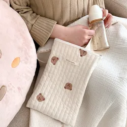 Bolsa de pañales acolchada con oso de peluche