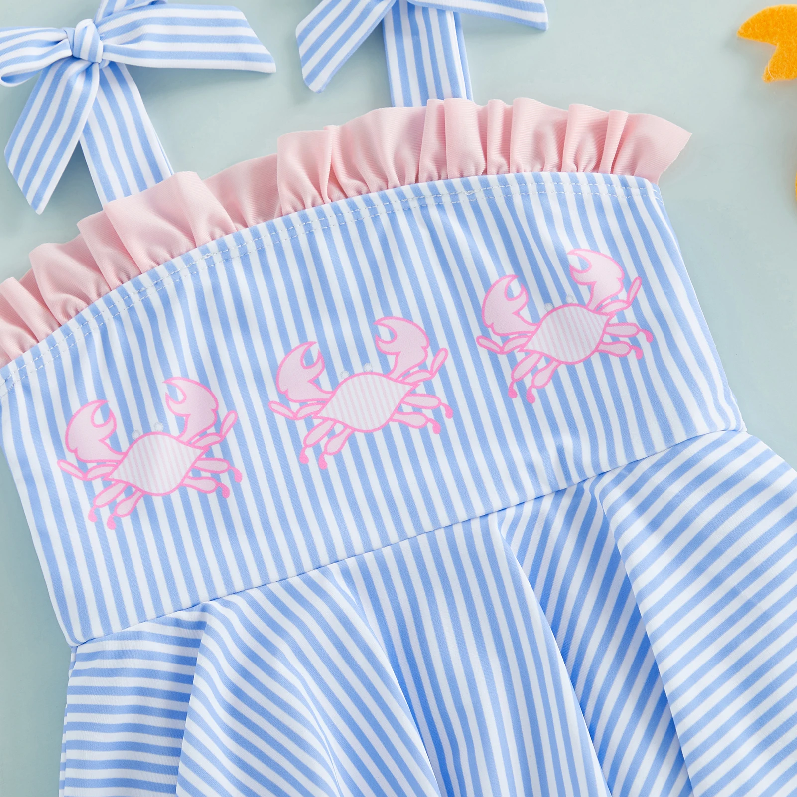 Bañador a rayas para niña con lazo y volantes, sin mangas - imagen 3