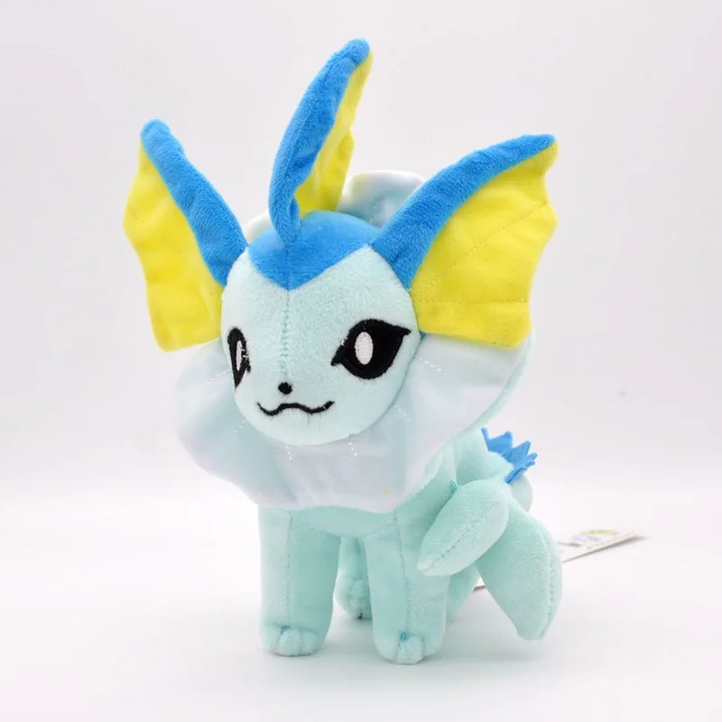 Peluche de Pikachu junto a Flareon