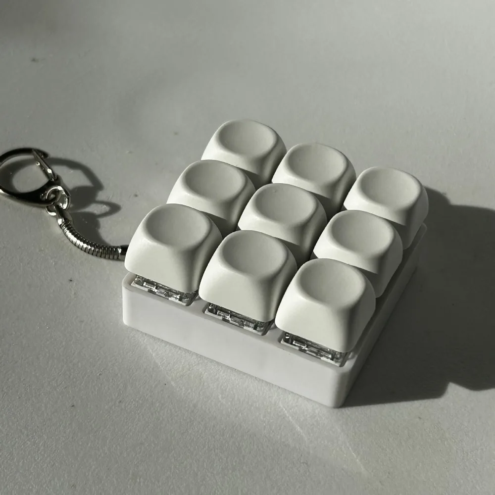 Llavero antiestrés con pulsadores de teclado para niños
