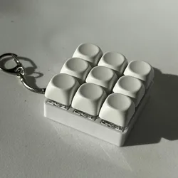 Llavero antiestrés con pulsadores de teclado para niños