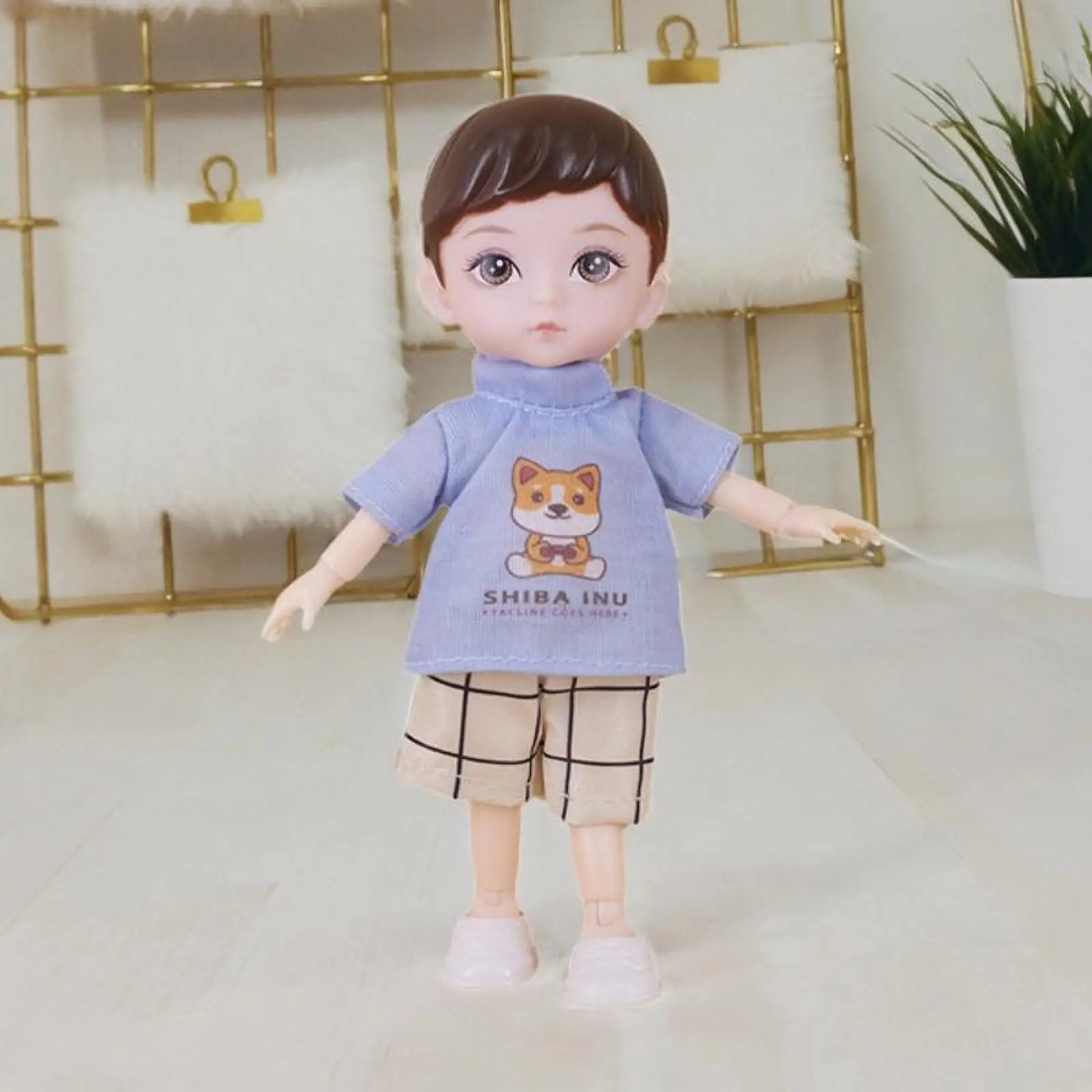 Muñeca articulada de niño con pelo corto y ojos marrones - imagen 5