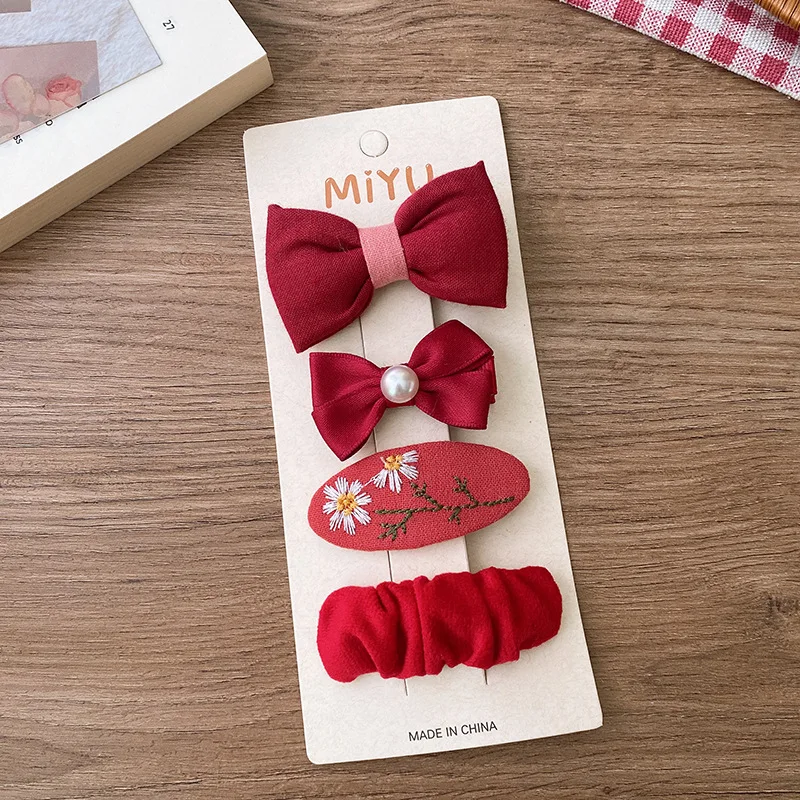Pinzas y horquillas Navideñas con lazo para niña