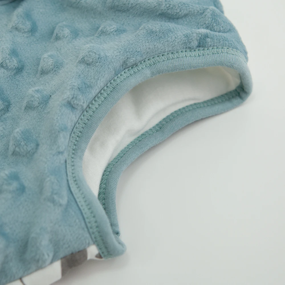 Saco de dormir para bebé en uso