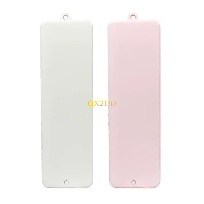 Peine plegable con espejo para bebés en color blanco y rosa, cerrado
