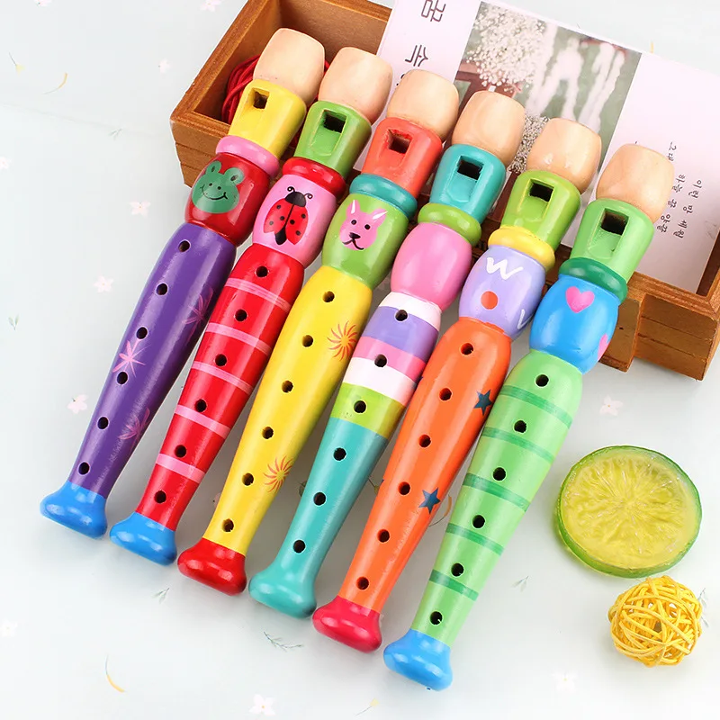 Juego de flauta y armónica de madera colorida