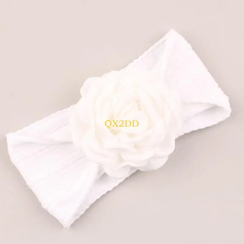 Diadema floral en tono pastel para bebé