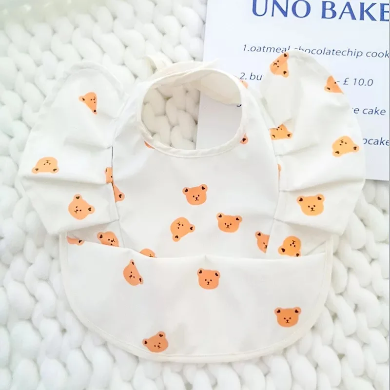 Babero/bata infantil para comidas con protección