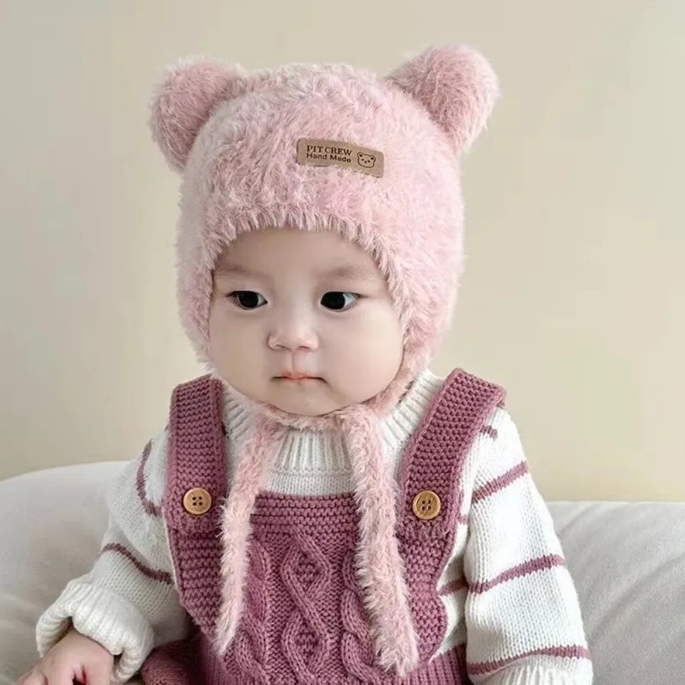 Gorro de felpa rosa con orejeras para invierno