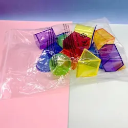 Bloques geométricos transparentes para aprendizaje tridimensional