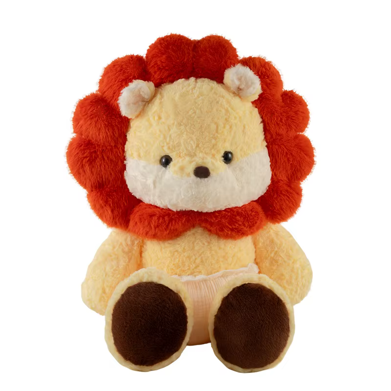 Pelucho colocado en una cama infantil como decoración